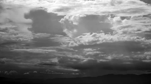Time-lapse of separate white clouds on a black background have real clouds Stock Footage 277173861