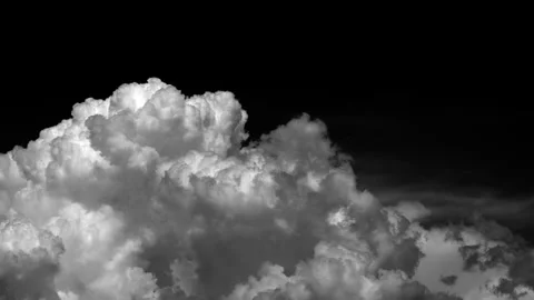 Time-lapse of separate white clouds on a black background Stock Footage 308455363