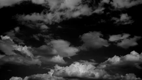 Time-lapse of separate white clouds on a black background have real clouds Stock Footage 308469600
