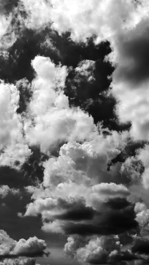 Time-lapse of separate white clouds on a black background have real clouds... Stock Footage 315550831