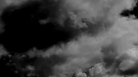 Time-lapse of separate white clouds on a black background has real clouds. .. Stock Footage 336904492