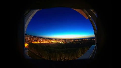 Time lapse sequence of sunset from window Stock Footage 77436511
