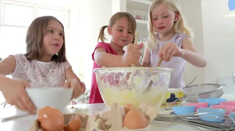 Time Lapse Sequence Of Three Girls Making Cake Together Stock Footage 40238352