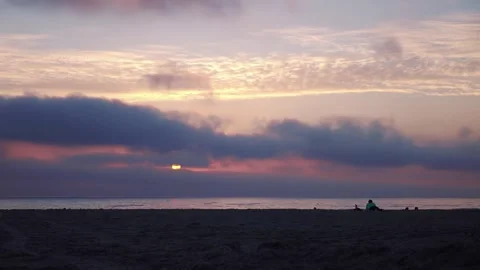 Time lapse of a serene sunset at a beach in California with clouds moving a.. Stock Footage 283478229