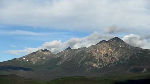 Time lapse of a set of sharp range of mountain peaks  Stock Footage 141285092