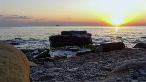 Time-lapse the setting sun on the calm sea Video stock 81355246