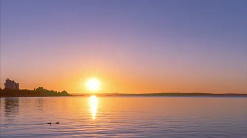 Time lapse of setting sun over lake. Summer sky on the Northern Russia Stock-Footage 194499087