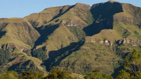 Time lapse of shadows moving across part of the Maloti Drakensberg Stock Footage 155387650