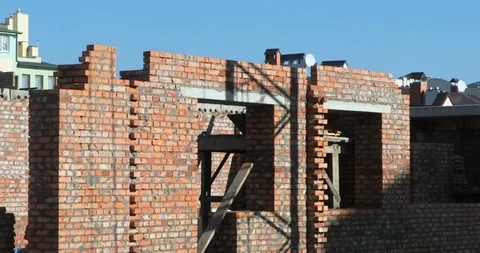 Time lapse of the shadows moving over wall at construction site Stock-Footage 103353039