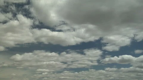 Time Lapse of Shallow Cumulus CLouds Racing Along in the Wind Stock Footage 54721966