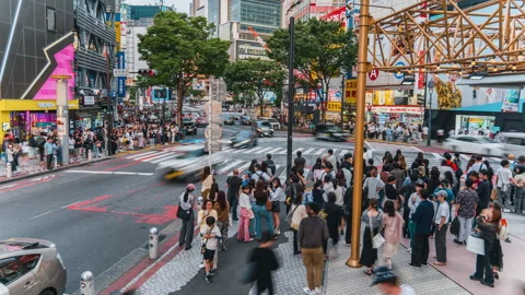 Time lapse at Shibuya intersection, crowded and traffic crossing Stock Footage 277139781