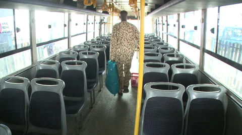 Time lapse, shiny new bus fills with passengers Stock Footage 38480468