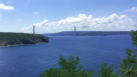 Time lapse of a ship passing under the Yavuz Sultan Selim bridge. Stock Footage 140396920