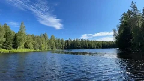Time lapse. Shooting from a floating boat. Sun of day. Fast river and clouds Stock Footage 160400879