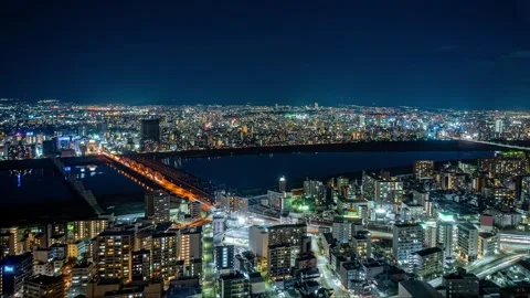 Time-lapse shooting of night view of high-rise buildings in Osaka, Japan Video stock 301589380