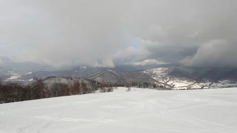 Time-lapse shooting in the snow-capped Carpathian Mountains Stockbeeldmateriaal 170654790