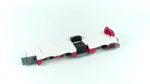 Time Lapse Shot Assembly Lego Constructor Fire Truck on a White Background. Stock-Footage 256678830