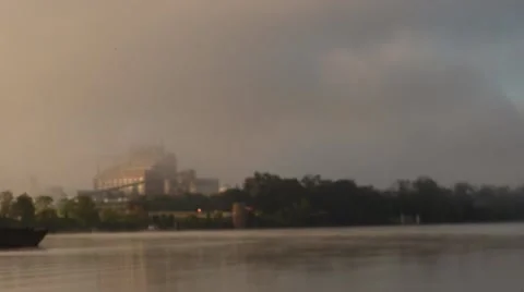 Time Lapse Shot of a Barge Passing a Factory on the Ohio River Stock Footage 57985291