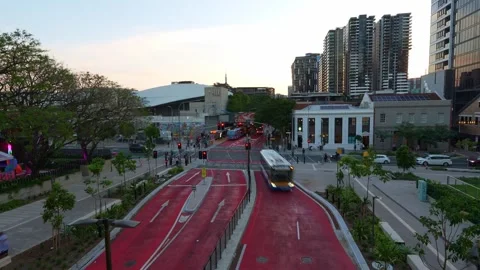 Time-lapse shot capturing busy buses passing through the Cultural Centre Stock Footage 318200064