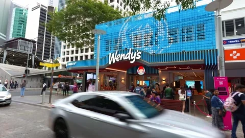 Time-lapse shot capturing the flagship Wendy's fast food restaurant in Stock Footage 325771923