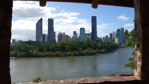 Time-lapse shot capturing the scenic Brisbane city skyline and river framed by Stock Footage 340029279