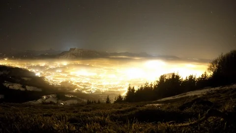 A time lapse shot of city lights glowing in salzburg in austria at night. Stock Footage 101149665