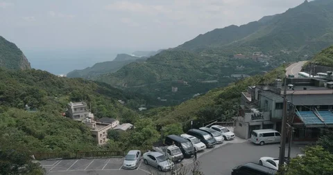 Time-lapse shot of cloud moving above Jiufen, also spelled Jioufen or Chiufen Stock Footage 89905741