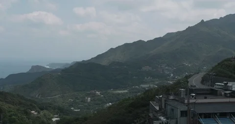 Time-lapse shot of cloud moving above Jiufen, also spelled Jioufen or Chiufen Stock Footage 89906515