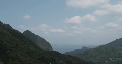 Time-lapse shot of cloud moving above Jiufen, also spelled Jioufen or Chiufen Stock Footage 89906529