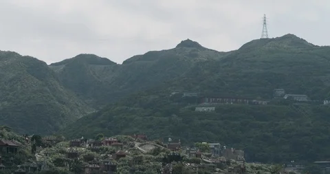 Time-lapse shot of cloud moving above Jiufen, also spelled Jioufen or Chiufen Stock Footage 89906738