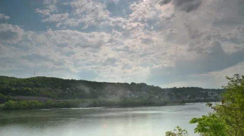 Time Lapse Shot of Clouds Letting Sun Come Through on Valley Hillside Stock Footage 58253062