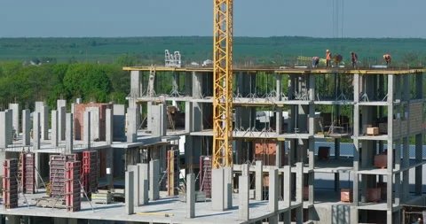 Time lapse shot of construction, building, workers, crane, equipment, concrete 動画素材 130715777