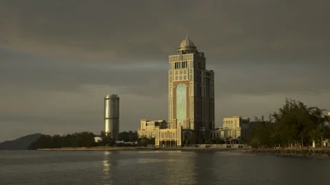 Time lapse shot during sunset with two iconic building at Sabah. The Kota Kinaba Stock Footage 255125633