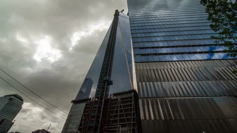 Time lapse shot of elevator at One World Trade Center angled up, cloudy day Stock Footage 99278343