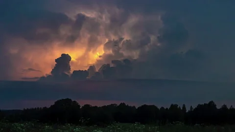 Time lapse shot of extreme Supercell Thunderstorm between clouds blinking Stock Footage 171108717