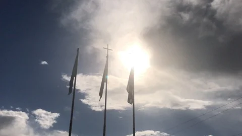 Time lapse Shot of Flags Waving against the Sun Stock-Footage 100677205