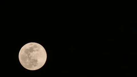 Time lapse shot of the full moon rising at night in Huelva, southern Spain Stock Footage 151234848