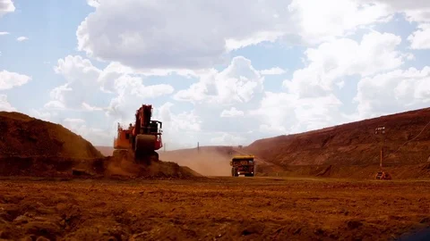 Time Lapse shot of Iron Ore being loaded onto truck Stock Footage