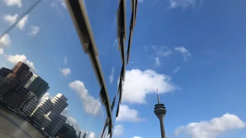 Time-lapse shot of landmarks reflecting in a building in Media harbor Stock Footage 158065222