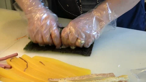 Time lapse shot of making Korean style sushi roll, Gimbap, Kimbap, 4K Stock Footage 97549702