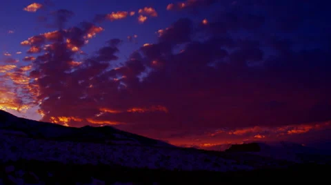 Time-lapse shot of mountain and clouds at dusk in Utah Stock Footage 52328241