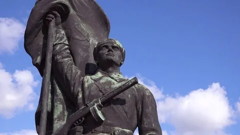 Time lapse shot of old Soviet era statues rusting in Memento Park outside Stock Footage 75710371