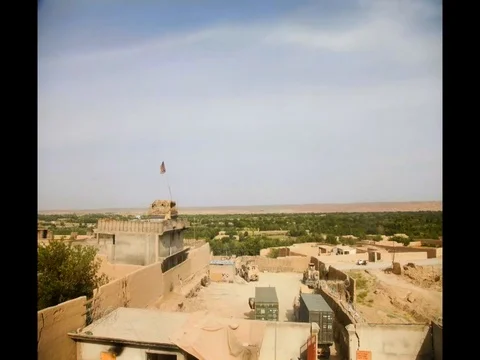 Time lapse shot over a U.S. military outpost in Afghanistan. 스톡 동영상 74814380