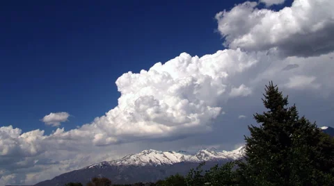 Time-lapse shot of sky and clouds over a mountain in Utah Video stock 52328169