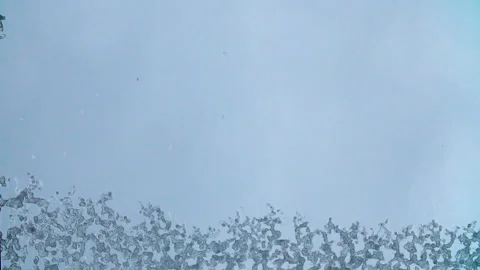 Time lapse shot of snow and ice melting on the glass Vídeos de archivo 88329086