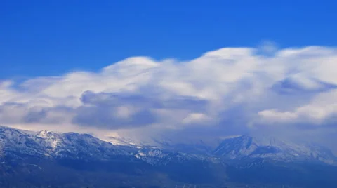 Time-lapse shot of snow-capped mountain peaks in Utah Stock Footage 52327758