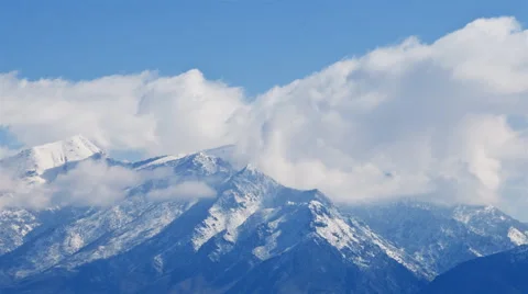 Time-lapse shot of snow-covered mountains in Utah Stock Footage 52328326
