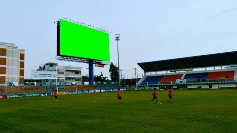 Time lapse shot of Soccer team praticing in Bangkok with green screen sign Stock Footage