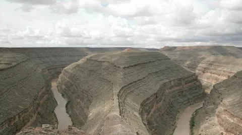 Time-lapse shot of storm clouds forming over a steep river valley in Goose Neck Video stock 11518999