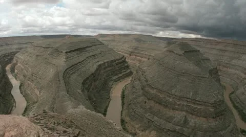 Time-lapse shot of storm clouds forming over a steep river valley in Goose Neck Video stock 11520609